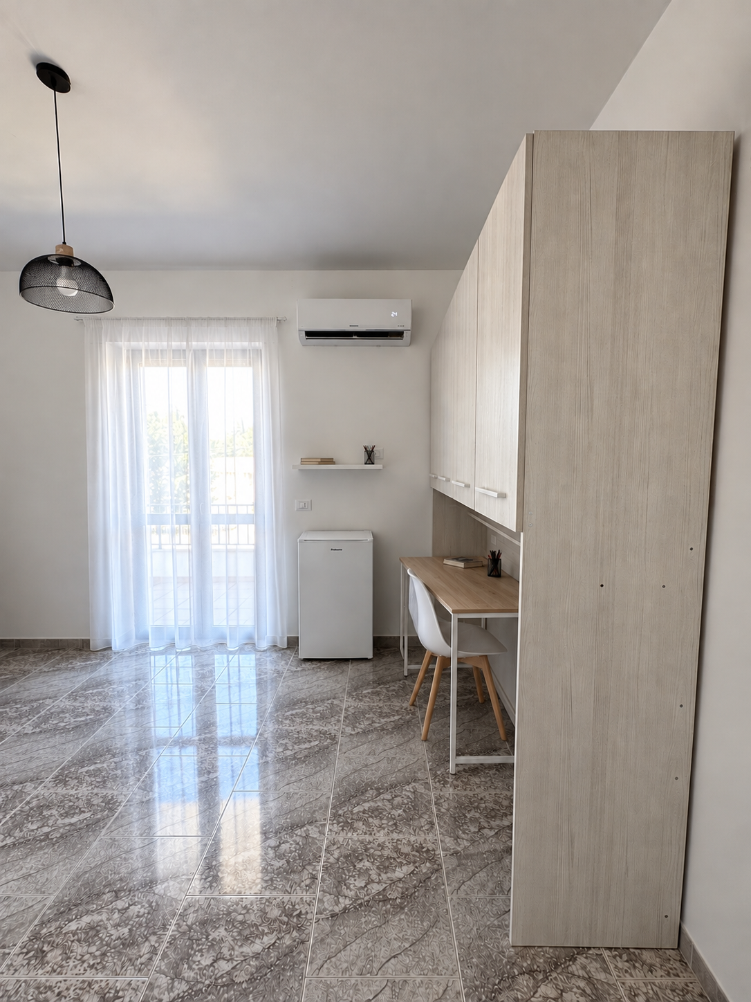 Camera 16 - Singola con balcone condiviso (1)